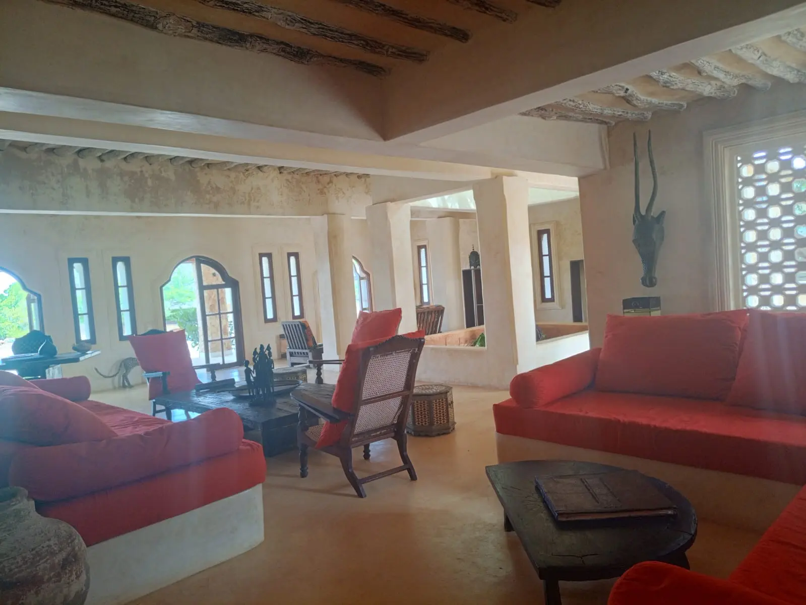Main living area showcasing open-plan design and traditional Swahili architecture