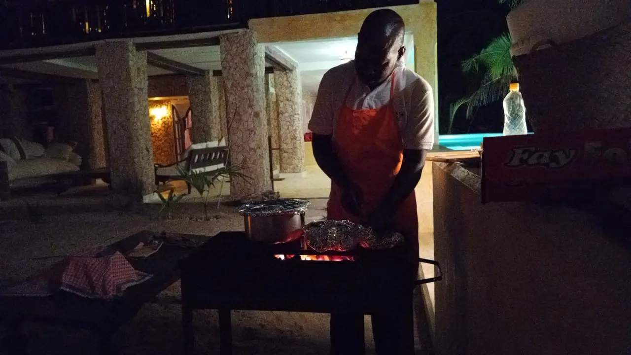 Private chef preparing authentic Swahili cuisine