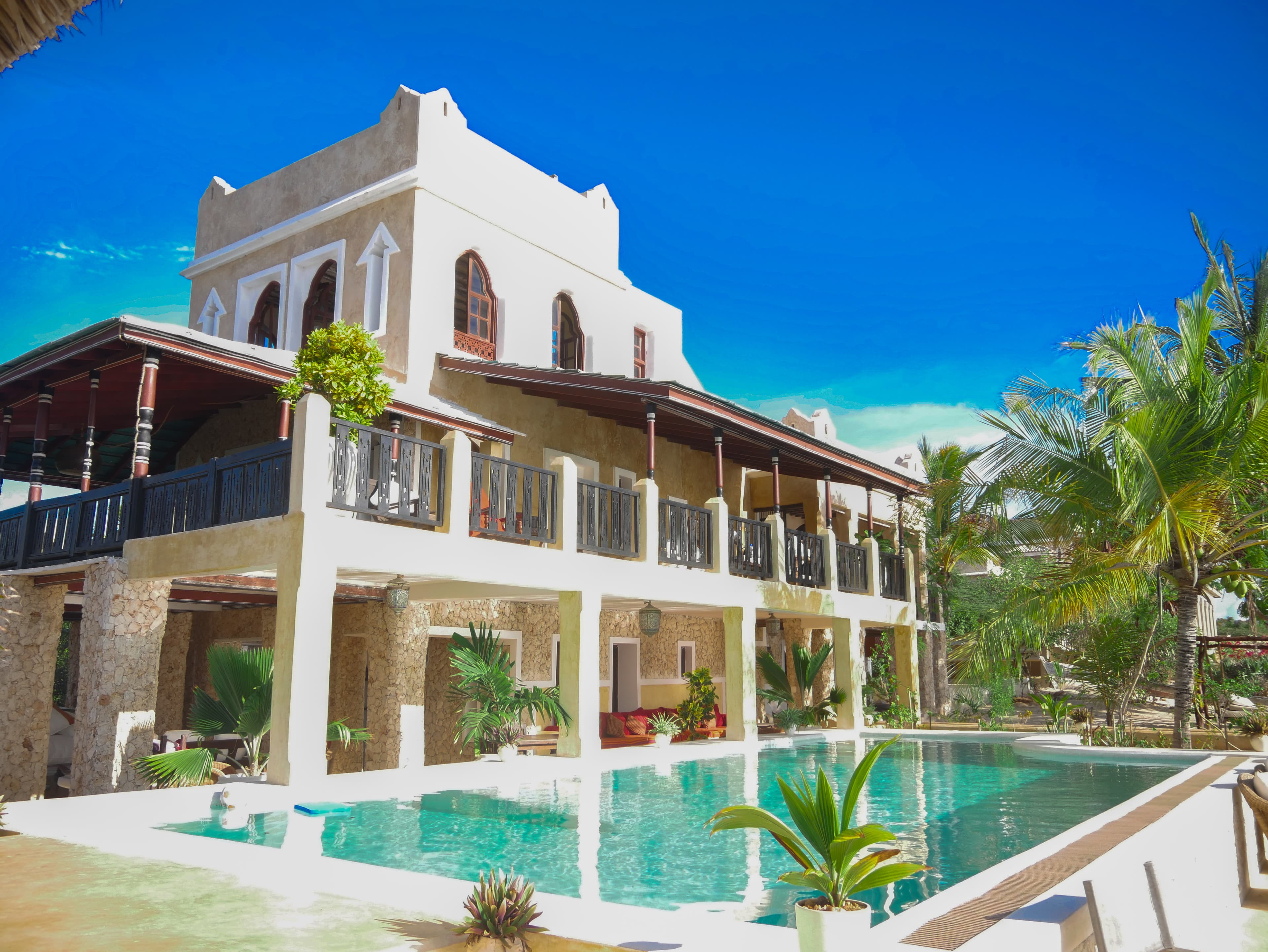Pool area and front of the villa
